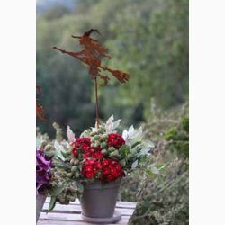 Lille flyvende heks p stang i jern