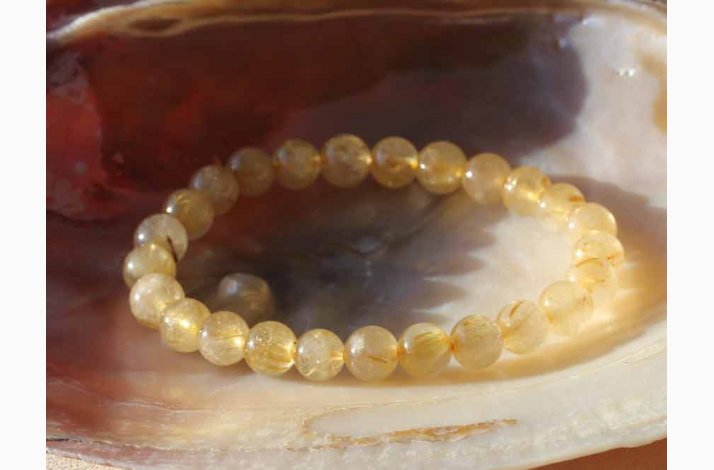 Armbnd rutileret kvarts (kugler 7-8 mm) krystal armbnd